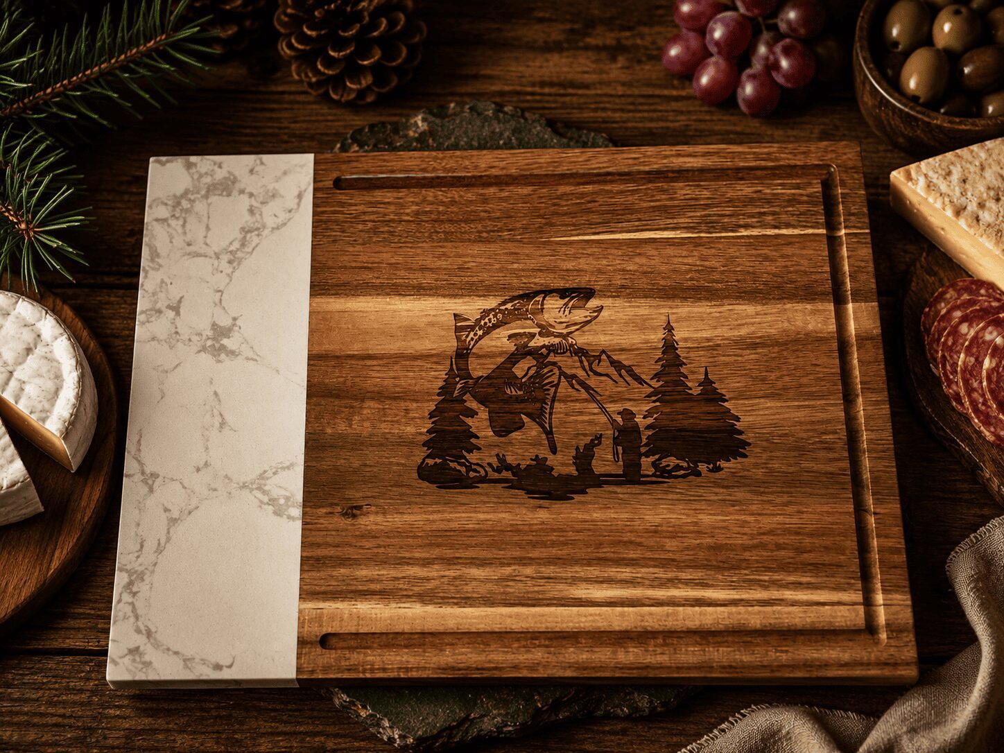 Wooden cutting board with engraved fish and trees