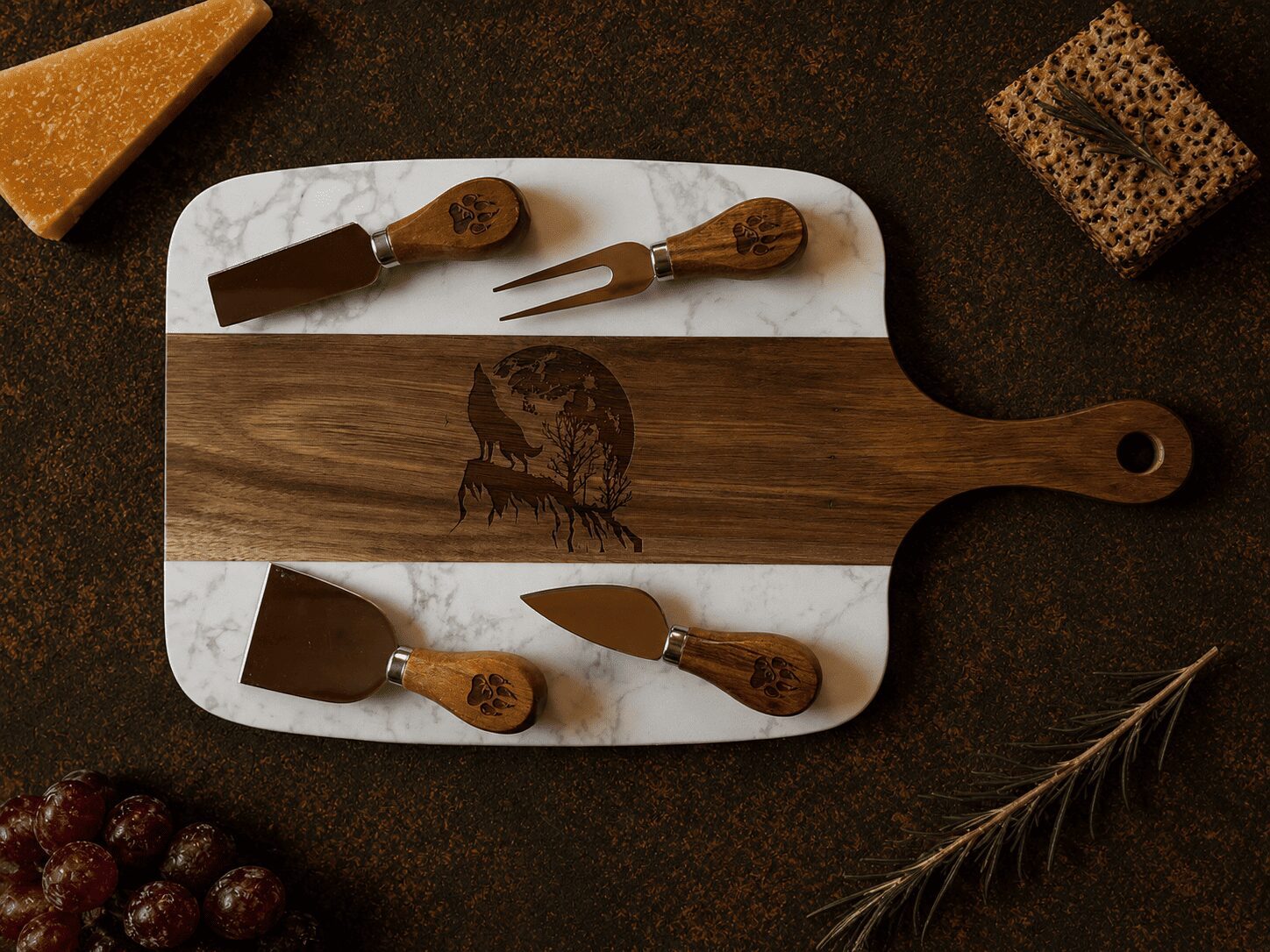 Marble and wood cheese board with knives